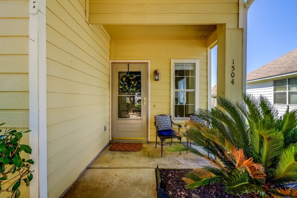 1504 East 19th Street Georgetown, TX 78626 - Photo 3 of 27 a backyard of a house with seating space