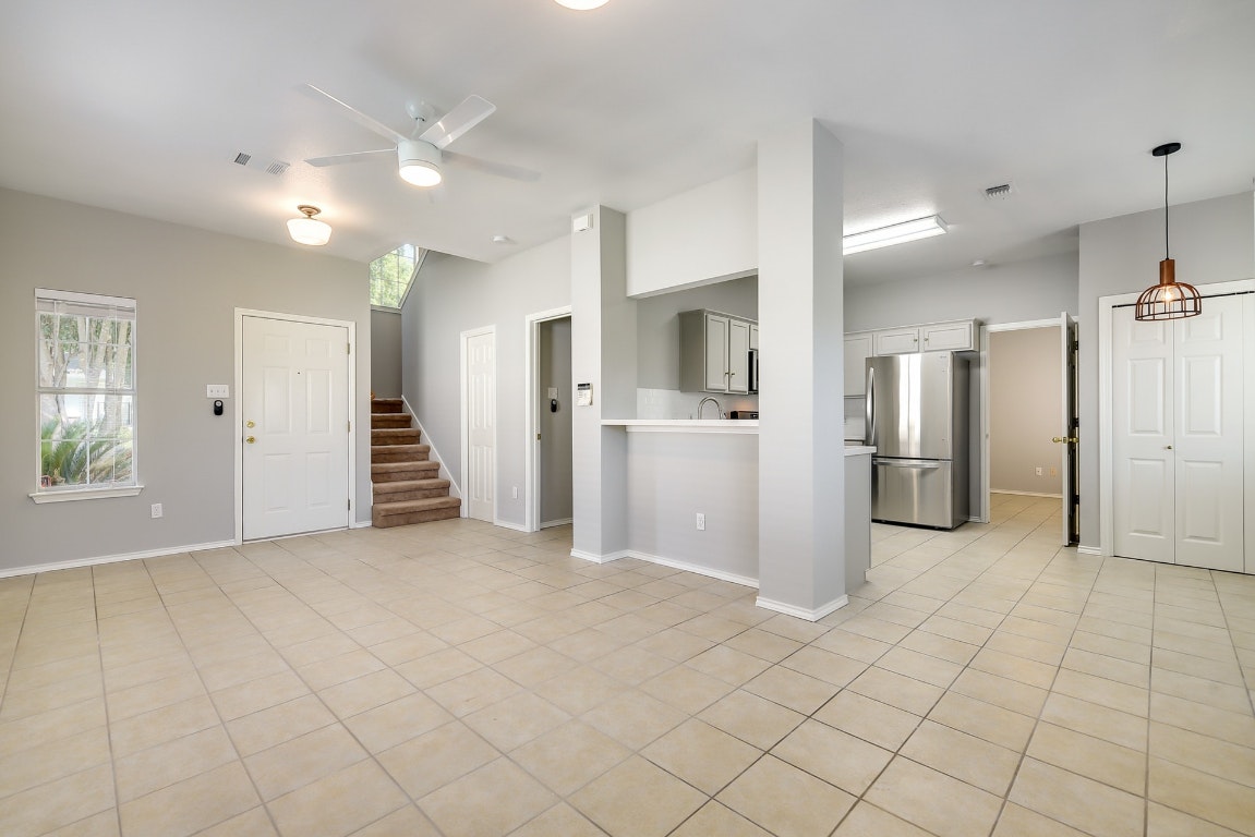 1504 East 19th Street Georgetown, TX 78626 - Photo 10 of 27 a view of a kitchen with a refrigerator and a sink
