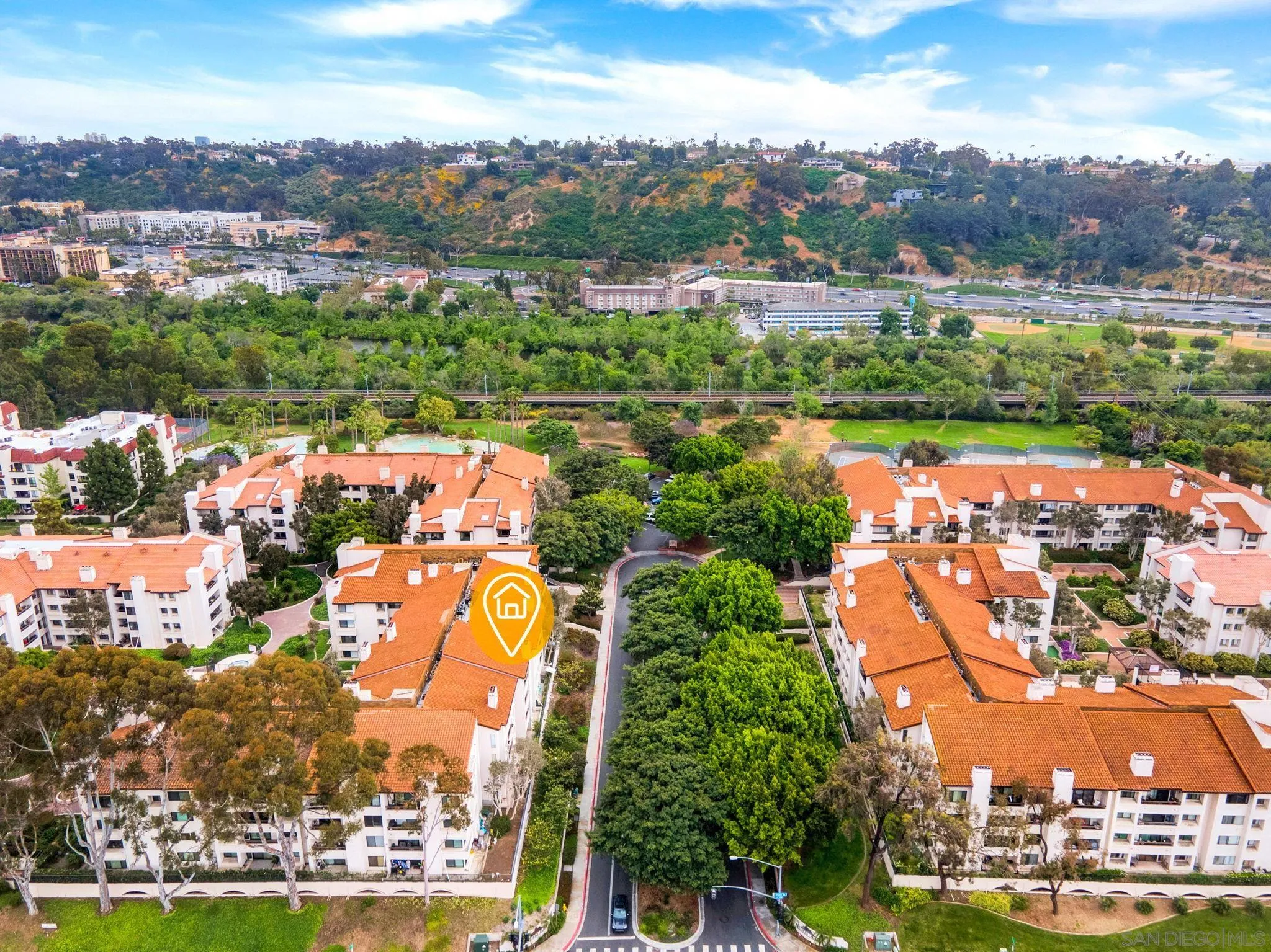 5705 Friars Road, Unit 8 San Diego, CA 92110 - Photo 19 of 26 an aerial view of residential building and lake