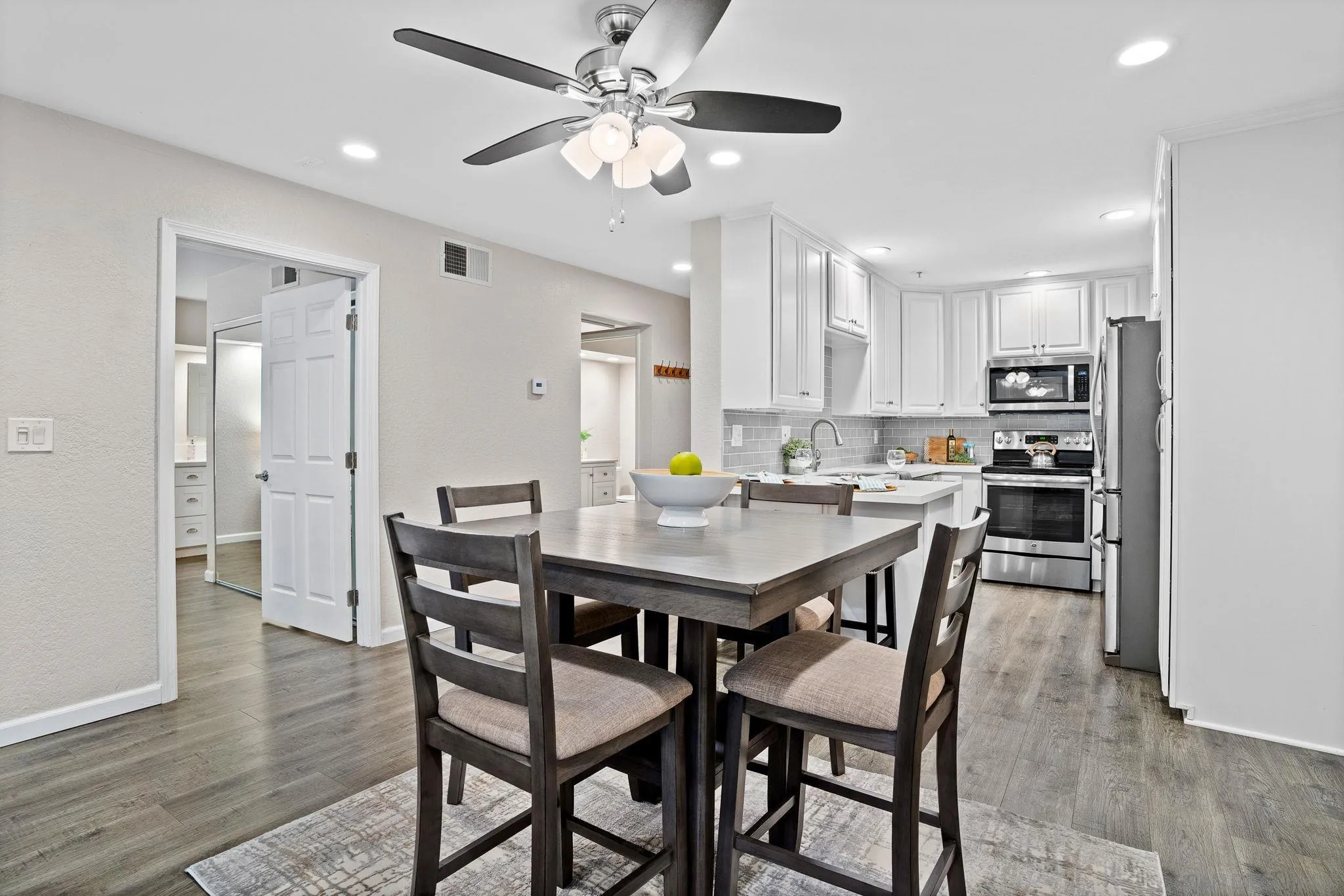 5705 Friars Road, Unit 8 San Diego, CA 92110 - Photo 6 of 26 a view of a dining room and livingroom view with furniture