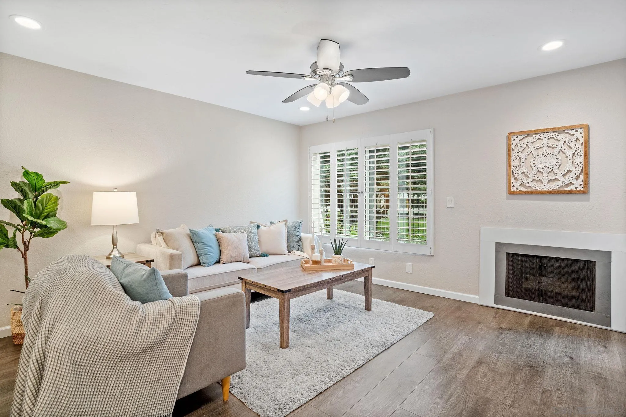 5705 Friars Road, Unit 8 San Diego, CA 92110 - Photo 10 of 26 a living room with furniture and a fireplace