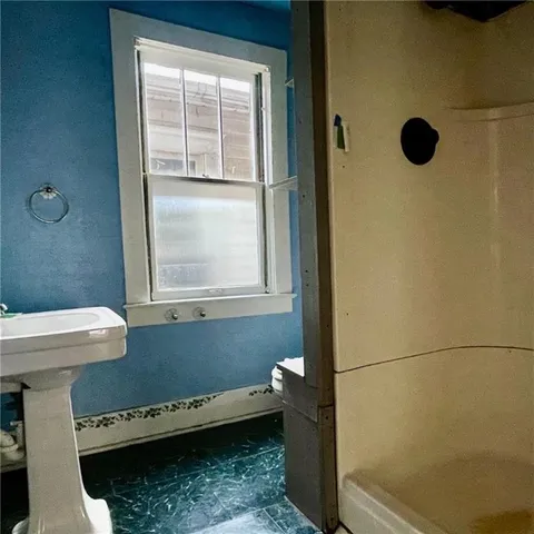 a bathroom with a window