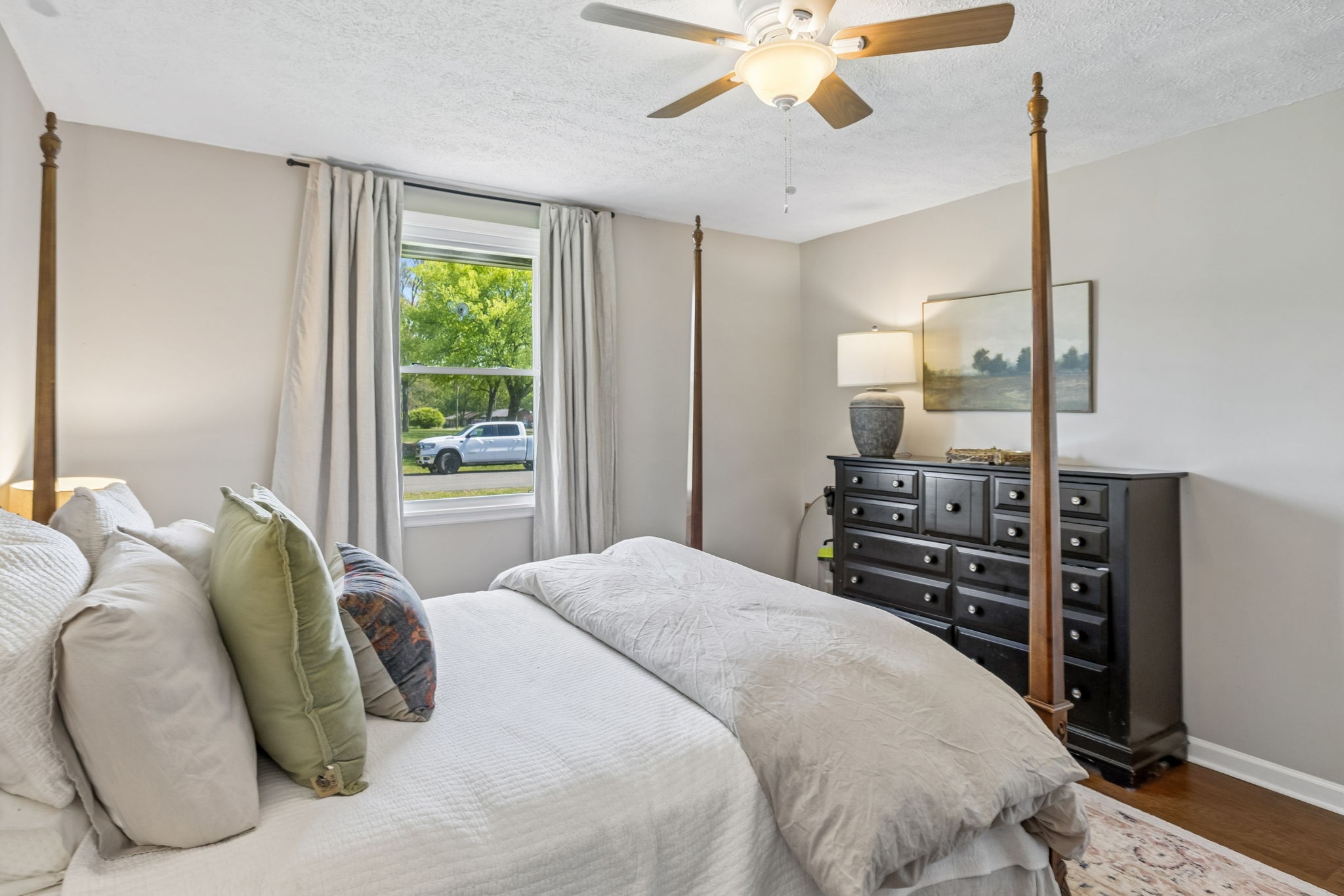 8617 Maple Street Murfreesboro, TN 37129 - Photo 11 of 31 a bedroom with a bed and a chandelier