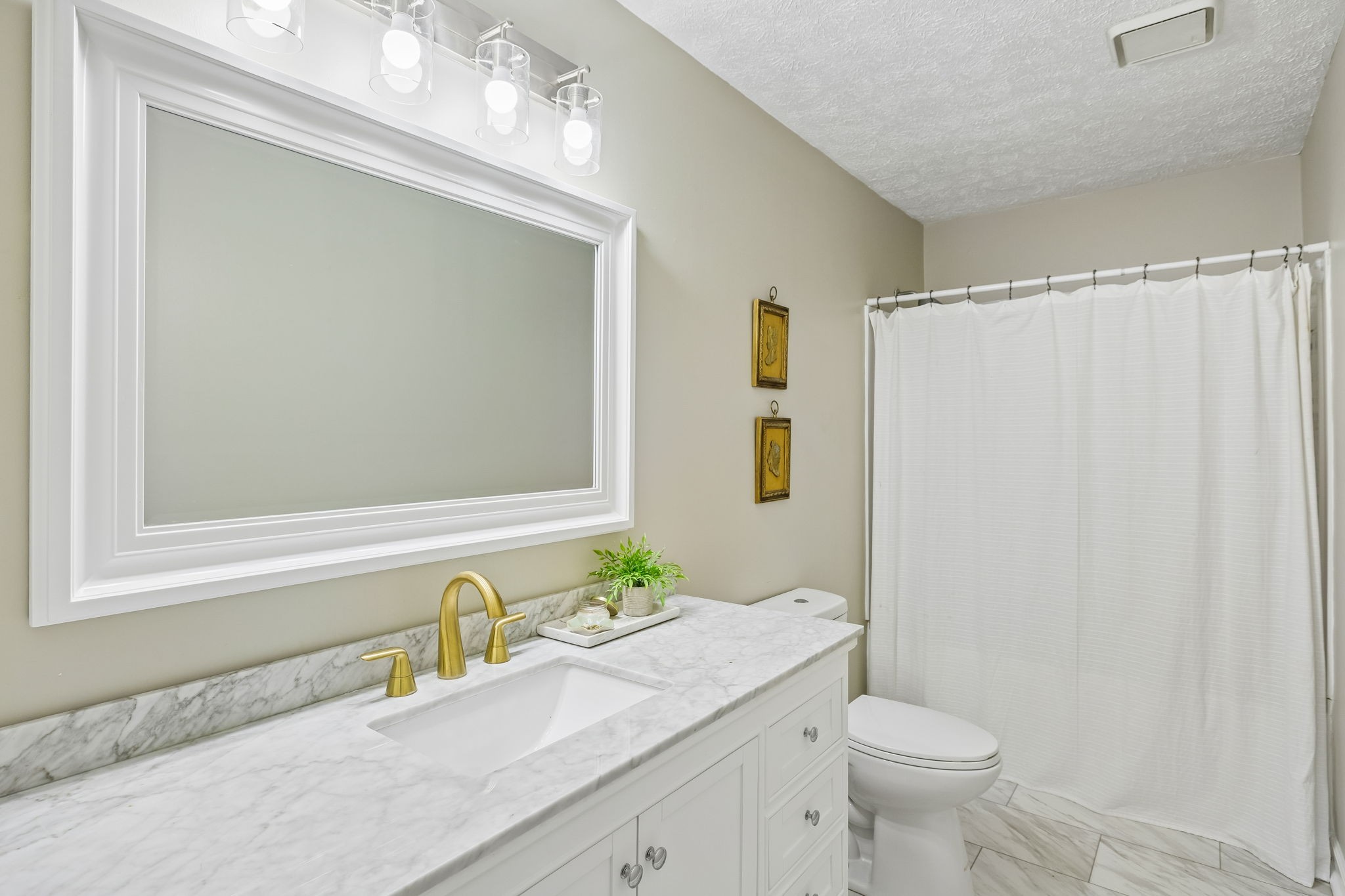 8617 Maple Street Murfreesboro, TN 37129 - Photo 12 of 31 a bathroom with a granite countertop sink toilet and shower