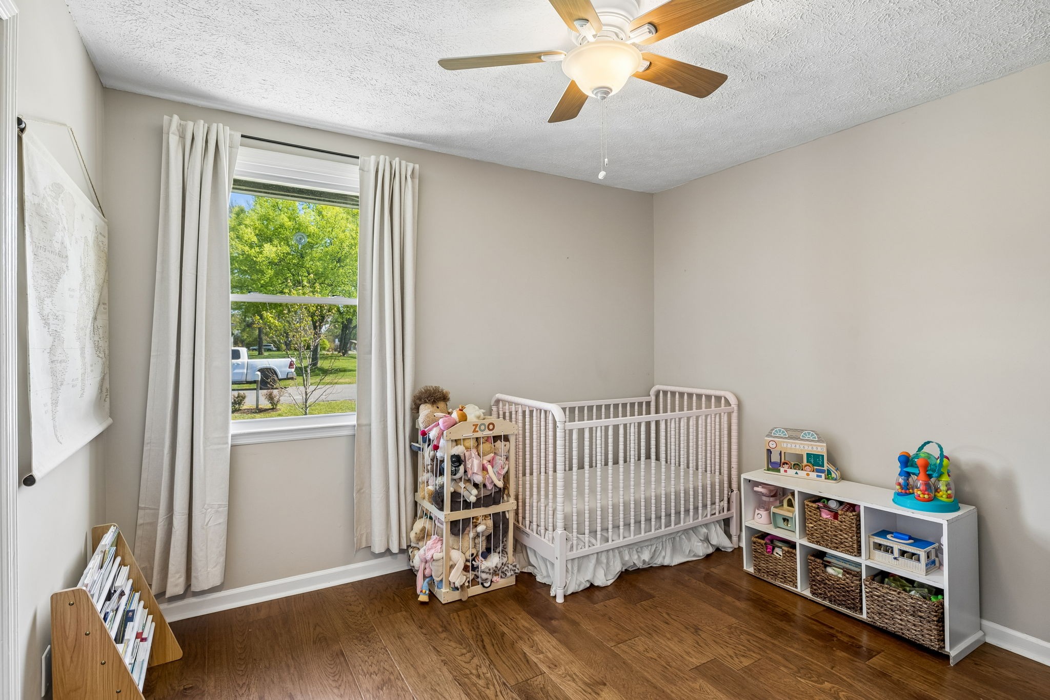 8617 Maple Street Murfreesboro, TN 37129 - Photo 13 of 31 a bedroom with furniture and a window