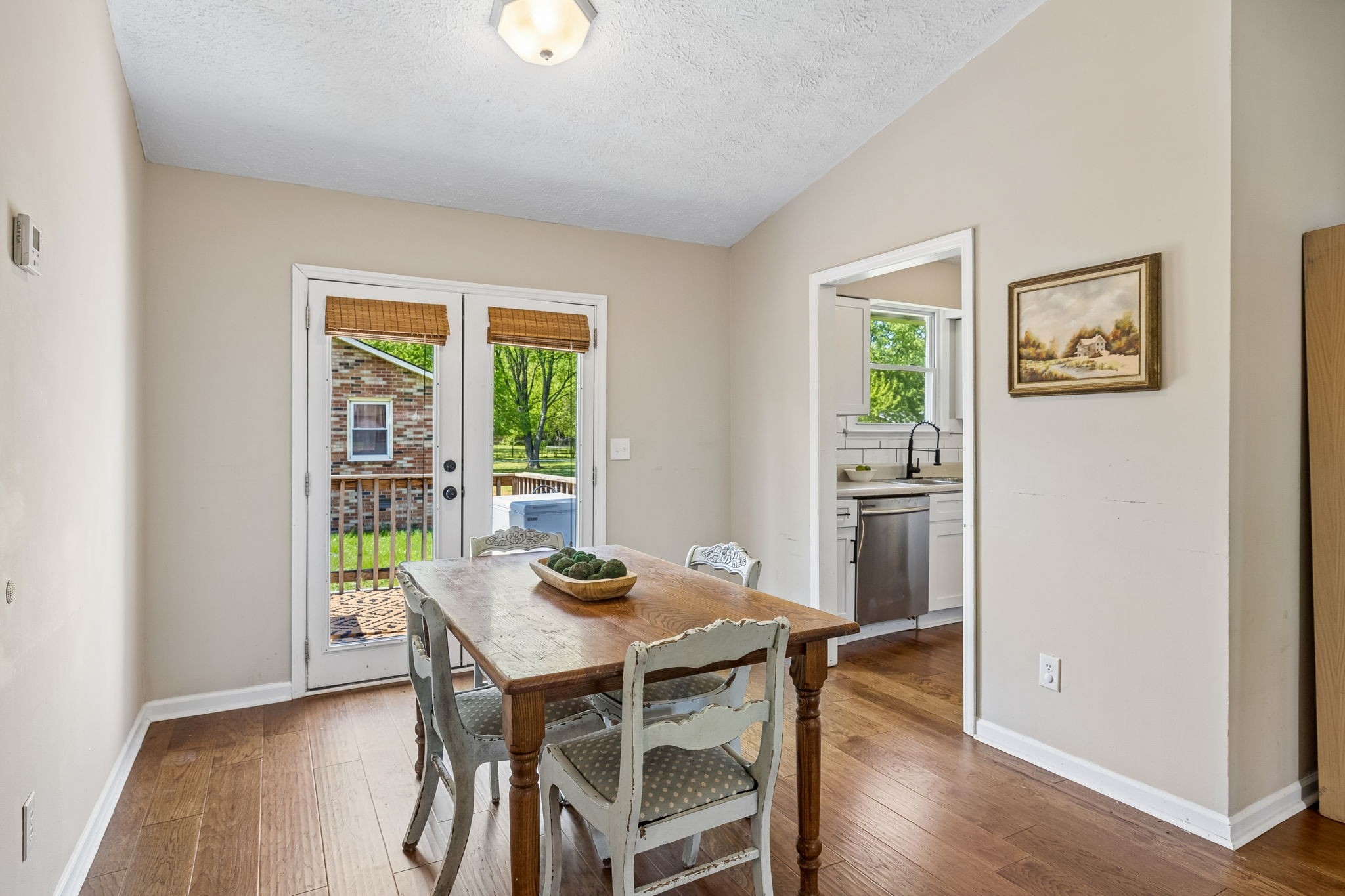 8617 Maple Street Murfreesboro, TN 37129 - Photo 18 of 31 a view of a dining room with furniture window and wooden floor