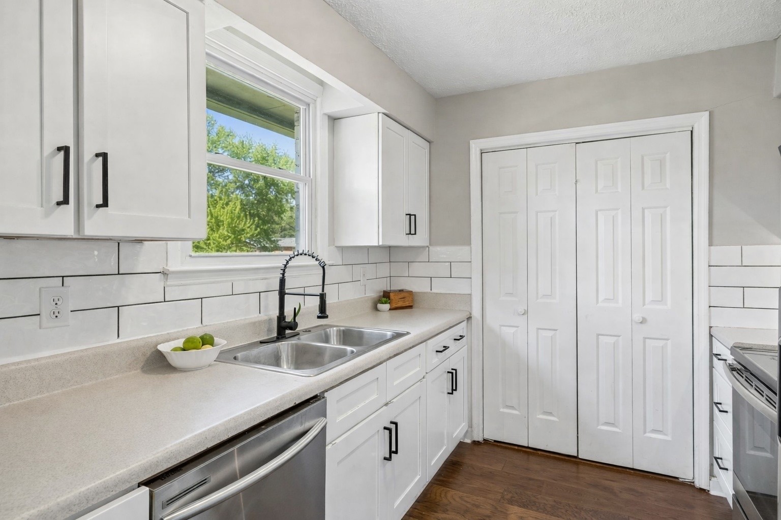 8617 Maple Street Murfreesboro, TN 37129 - Photo 20 of 31 a kitchen with white cabinets and sink