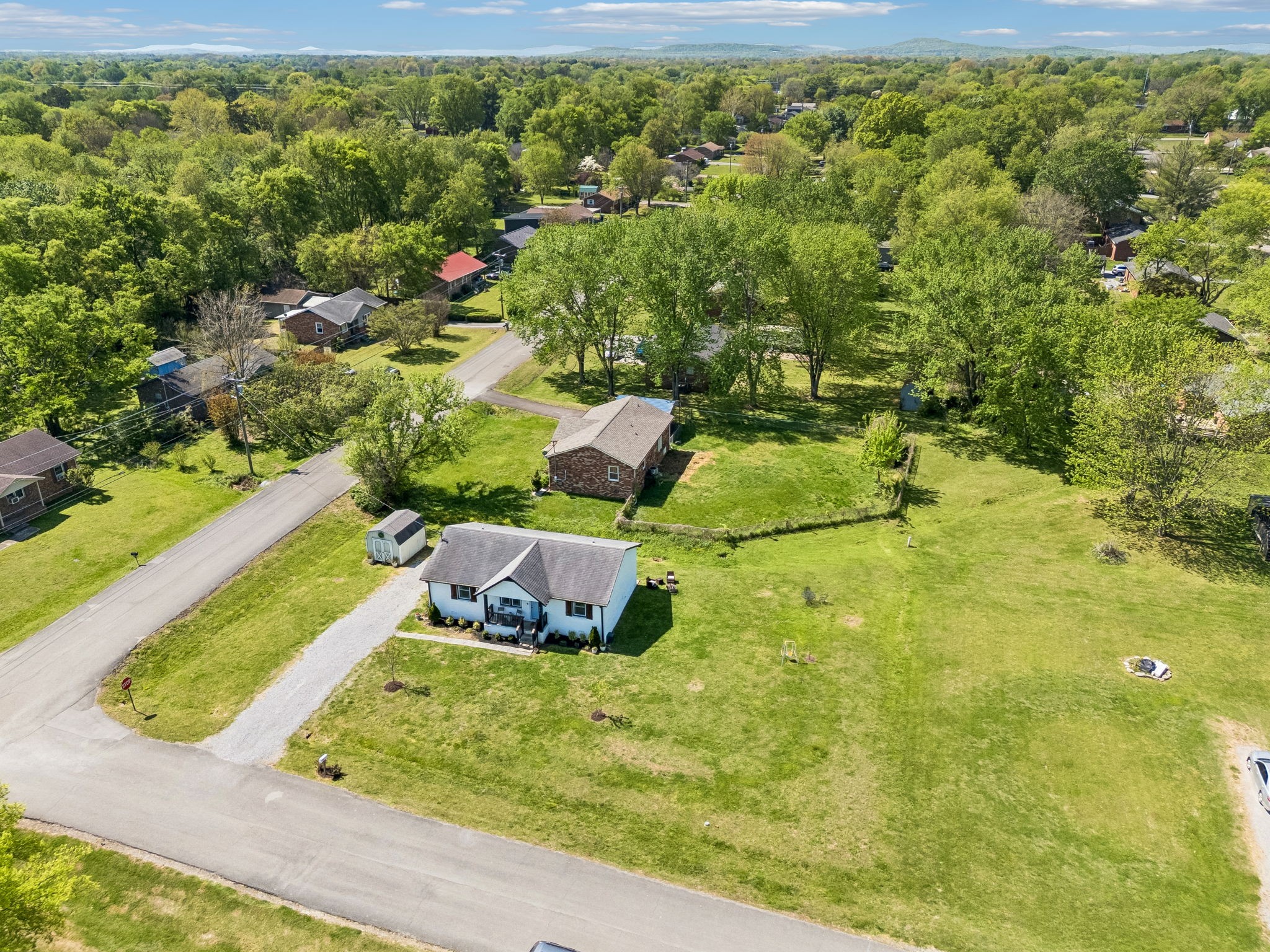 8617 Maple Street Murfreesboro, TN 37129 - Photo 28 of 31 a bathroom with a sink and mirror