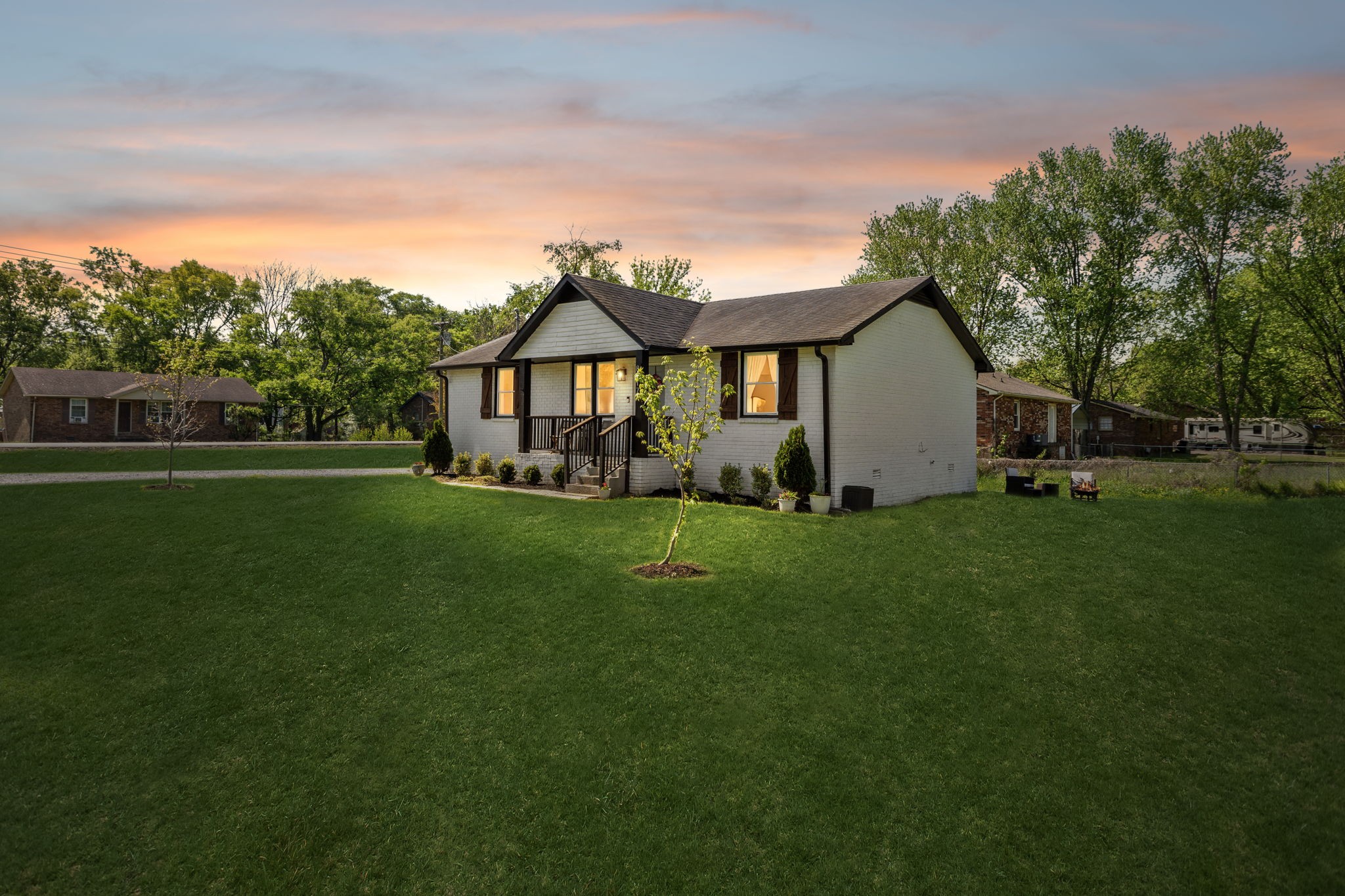 8617 Maple Street Murfreesboro, TN 37129 - Photo 31 of 31 a front view of a house with garden