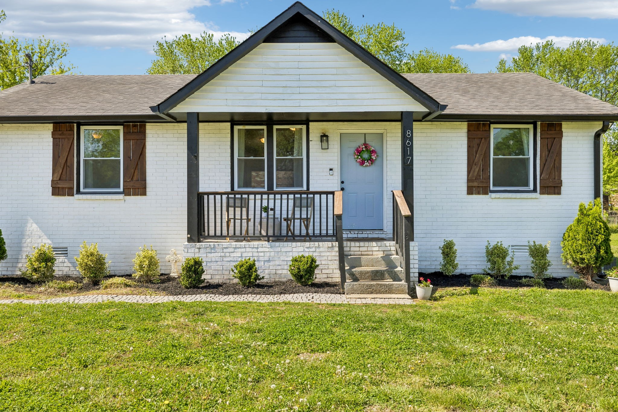 8617 Maple Street Murfreesboro, TN 37129 - Photo 4 of 31 a house view with a garden space