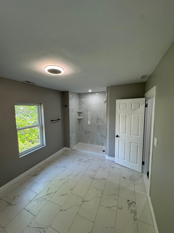32 Main Street Monson, MA 01057 - Photo 40 of 42 a view of an empty room and a window