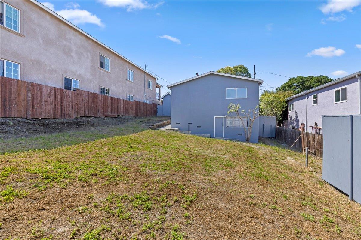 231 Pinole Avenue Rodeo, CA 94572 - Photo 19 of 26 a view of a backyard of the house
