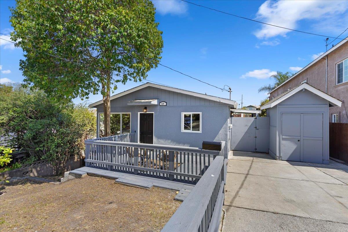 231 Pinole Avenue Rodeo, CA 94572 - Photo 24 of 26 a view of a house with a balcony