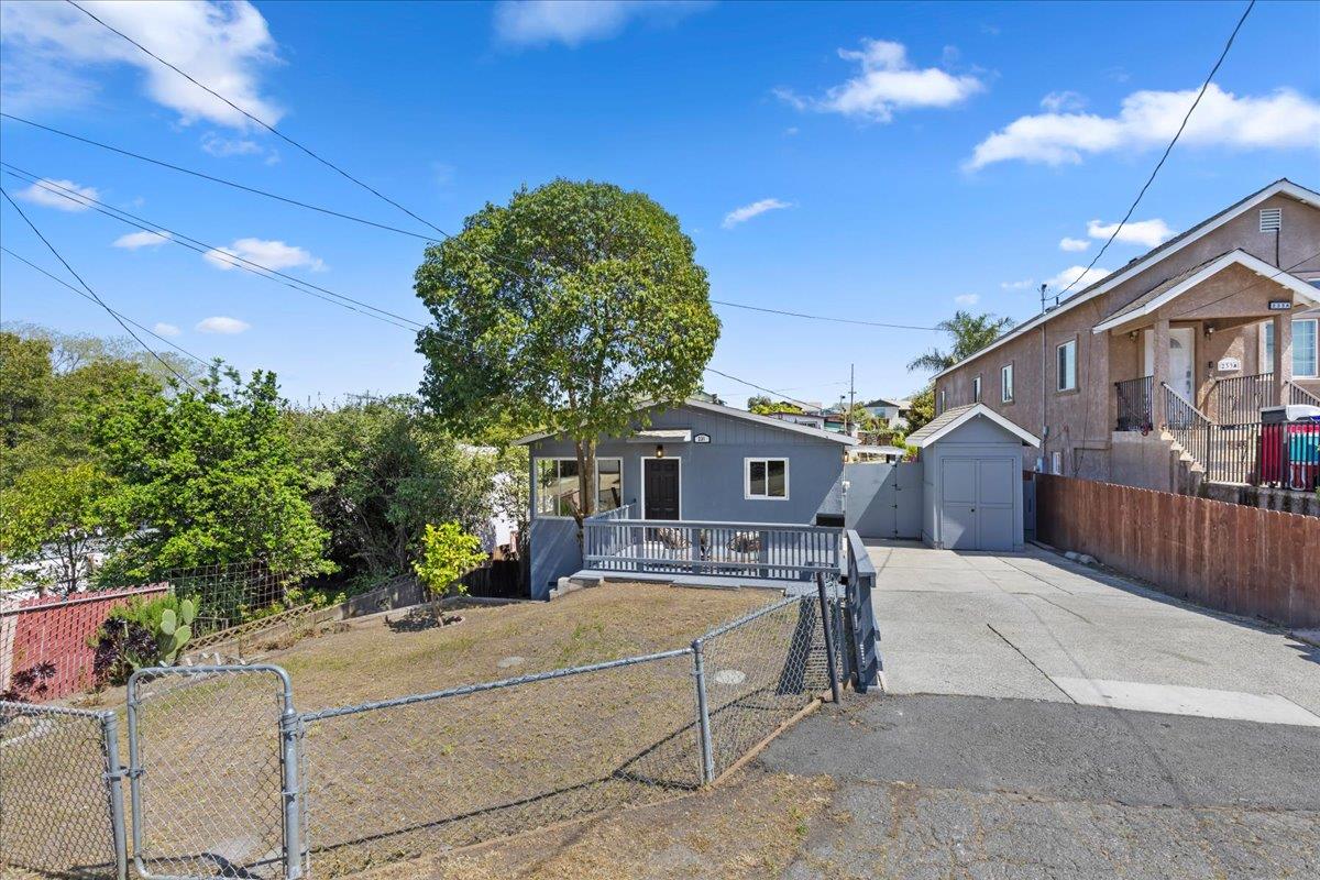 231 Pinole Avenue Rodeo, CA 94572 - Photo 25 of 26 a front view of a house with a yard