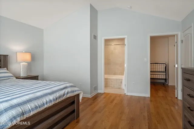 a bathroom with a bathtub and a toilet