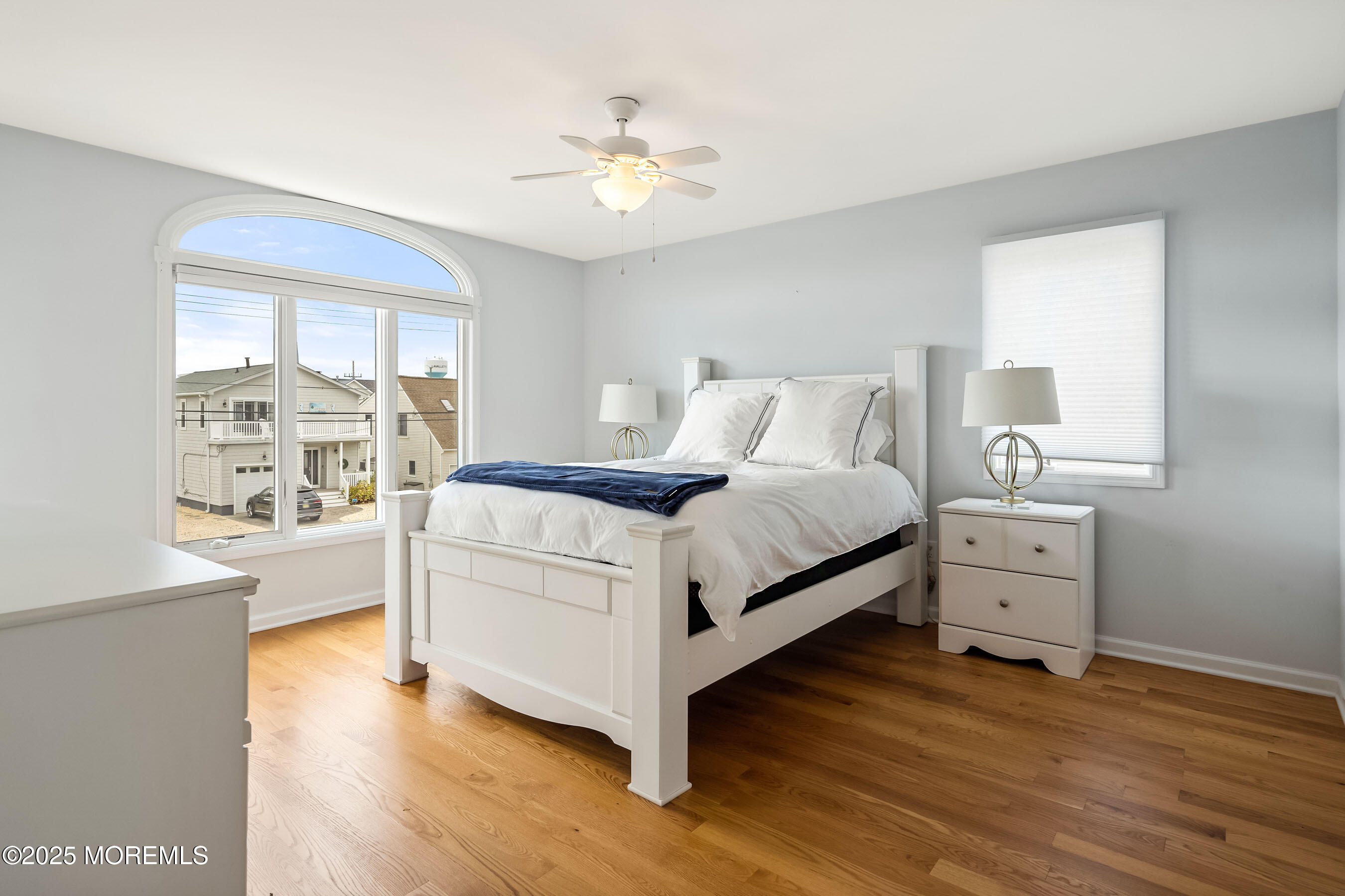 21 Magee Avenue Lavallette, NJ 08735 - Photo 17 of 25 a bed room with a bed and a window