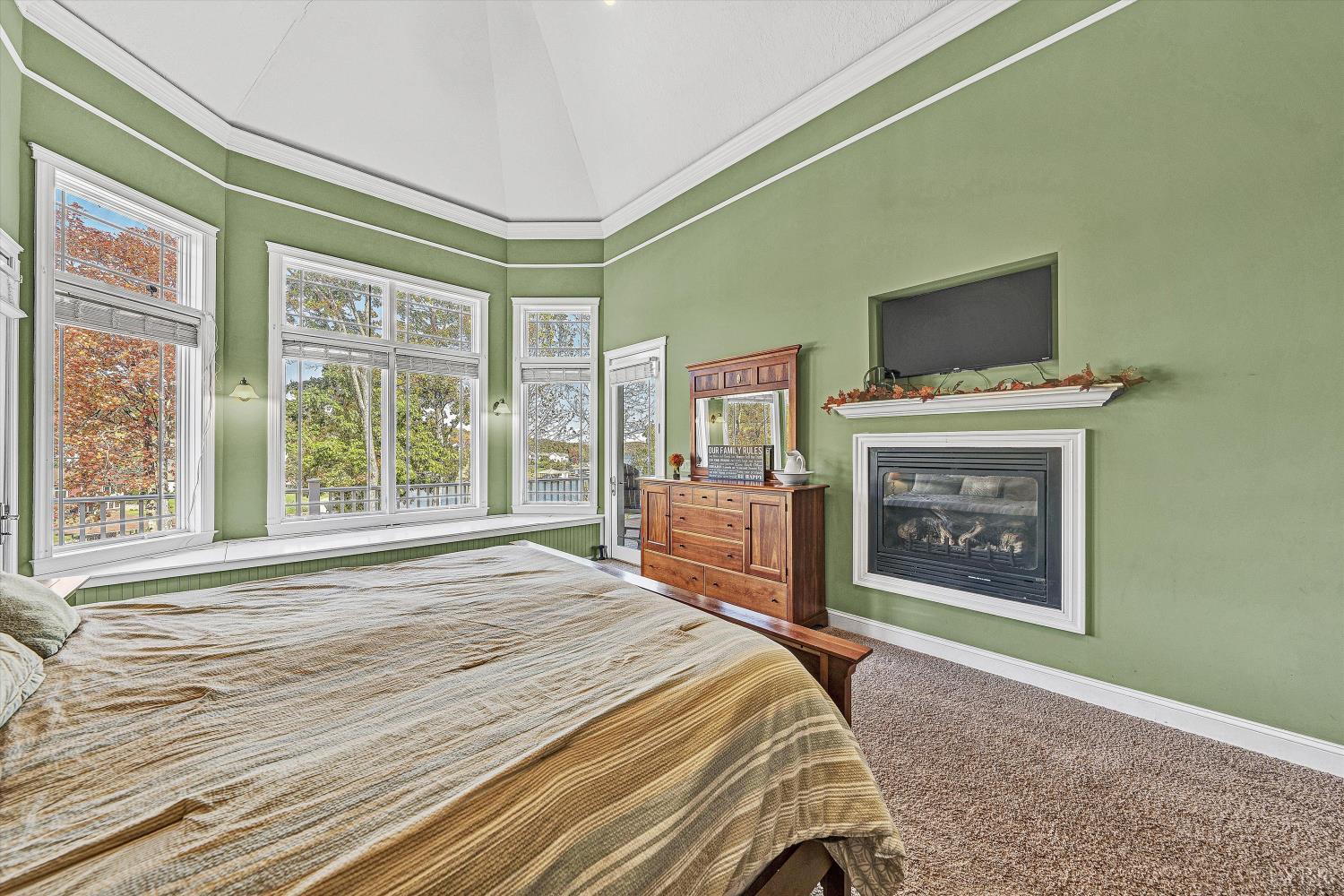 803 Compass Cove Circle Moneta, VA 24121 - Photo 12 of 92 a bedroom with a bed and a television
