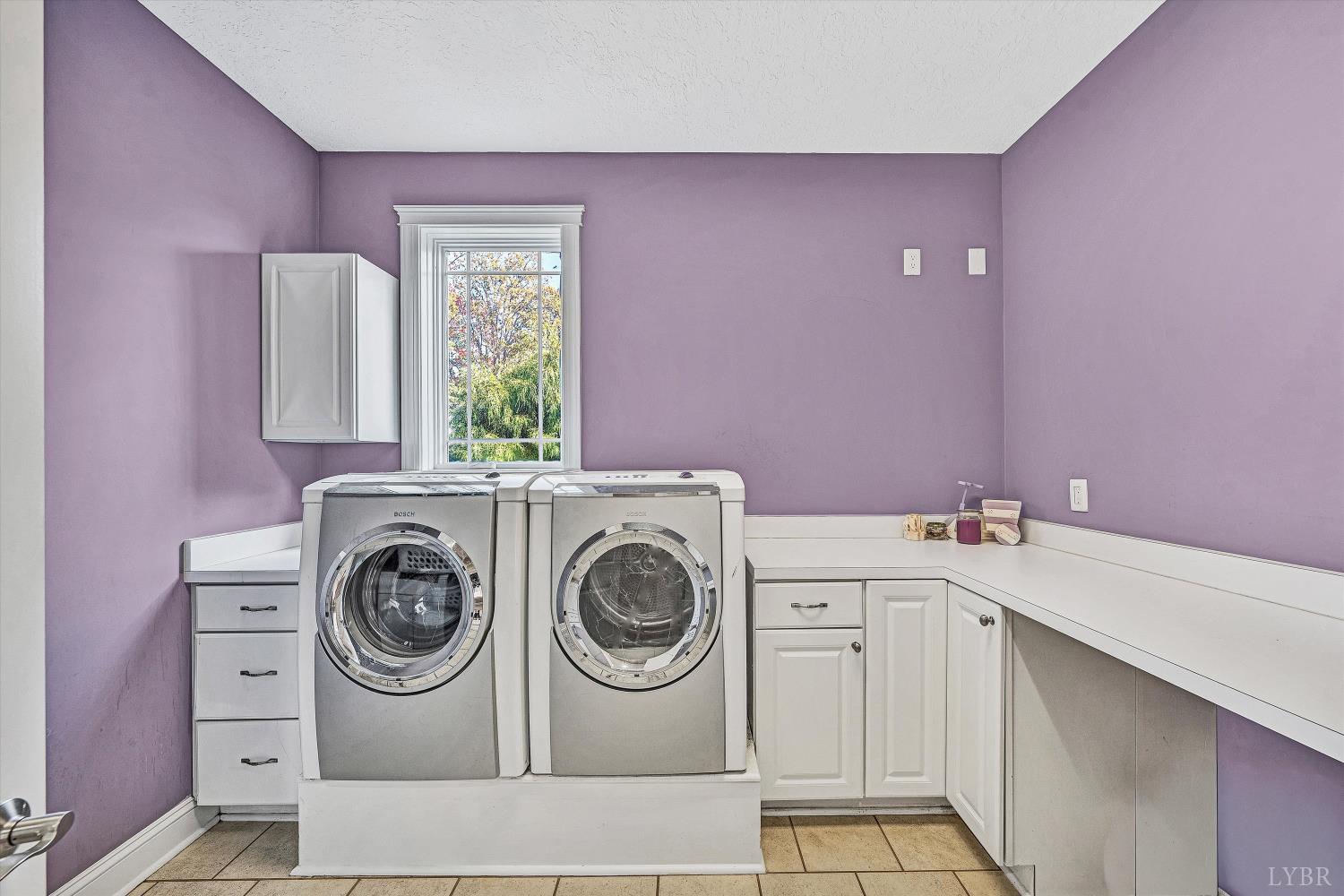 803 Compass Cove Circle Moneta, VA 24121 - Photo 34 of 92 a utility room with dryer and washer