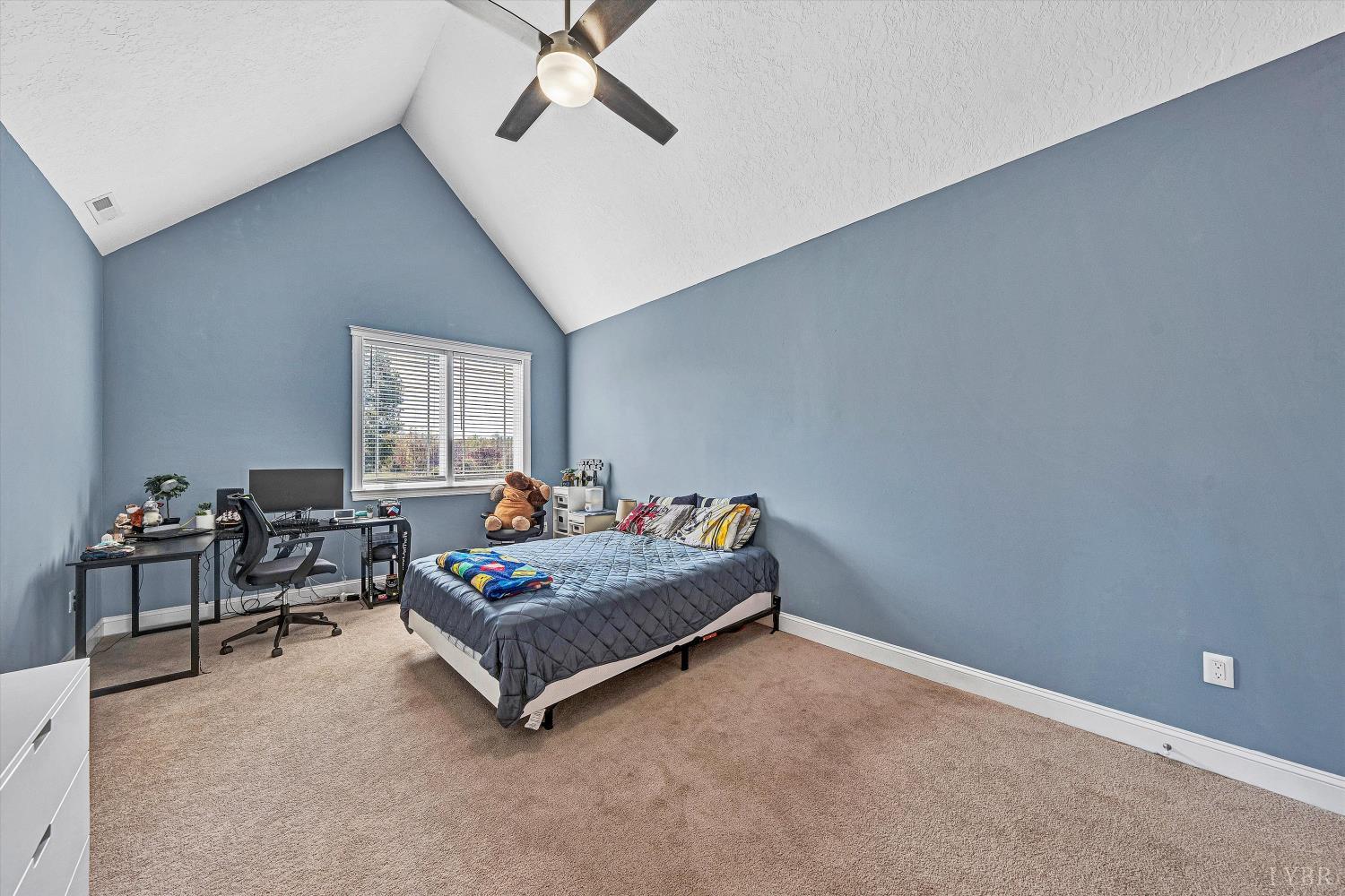 803 Compass Cove Circle Moneta, VA 24121 - Photo 53 of 92 a living room with furniture and a window