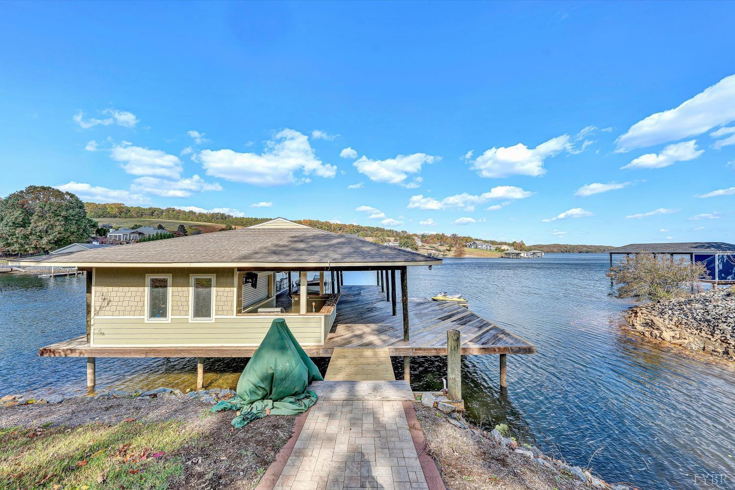 803 Compass Cove Circle Moneta, VA 24121 - Photo 69 of 92 a house view with a garden space