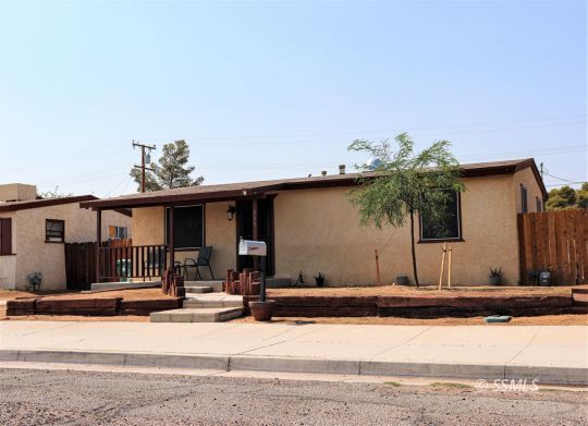 333 North Helena Street Ridgecrest, CA 93555 - Photo 3 of 35 a front view of a house with a yard