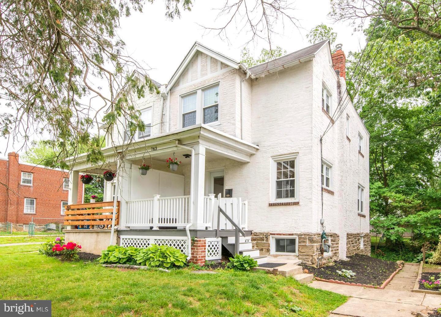 763 Humphreys Road Ardmore, PA 19003 - Photo 1 of 28 front view of a house with a yard