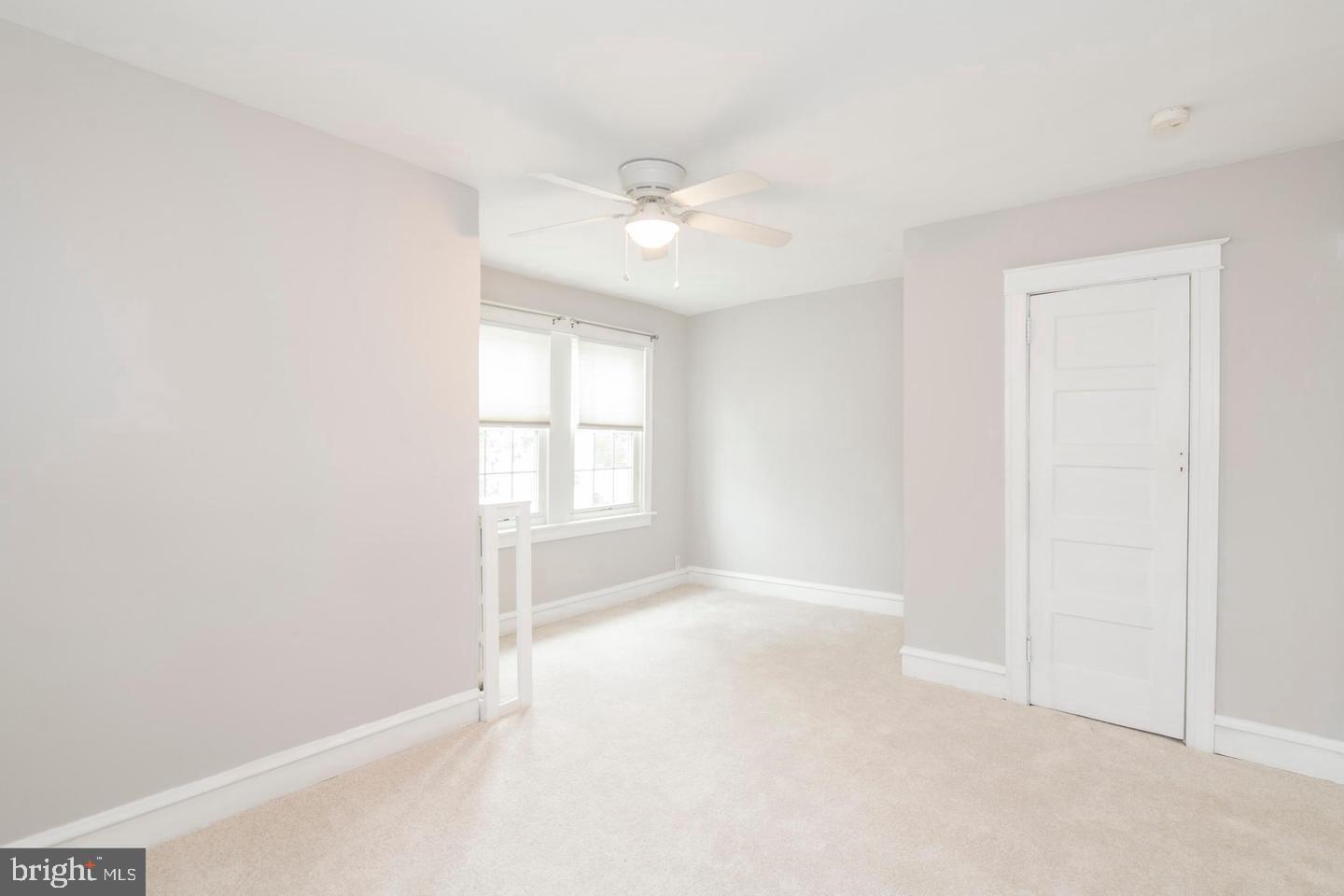 763 Humphreys Road Ardmore, PA 19003 - Photo 14 of 28 an empty room with windows and fan