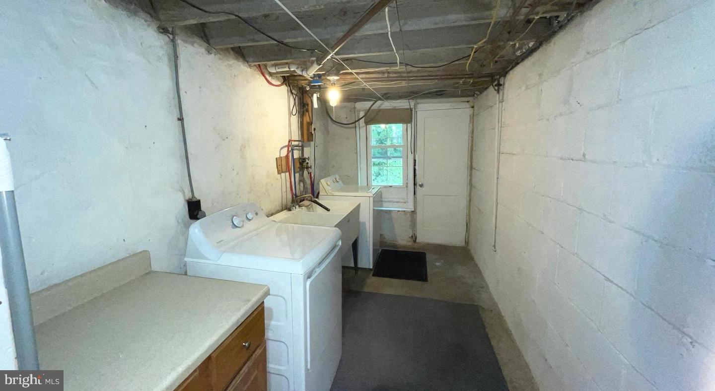 763 Humphreys Road Ardmore, PA 19003 - Photo 21 of 28 a bathroom with a sink a toilet and a shower