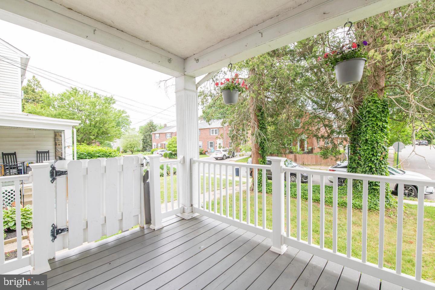 763 Humphreys Road Ardmore, PA 19003 - Photo 3 of 28 a view of a wooden deck with a yard