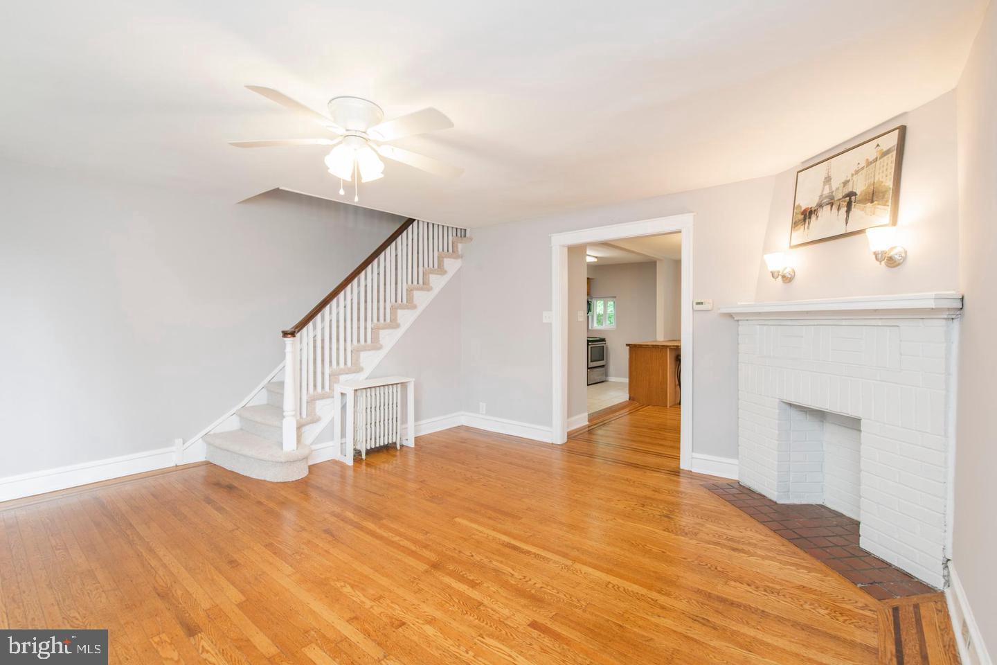 763 Humphreys Road Ardmore, PA 19003 - Photo 6 of 28 a view of an empty room with wooden floor and a window