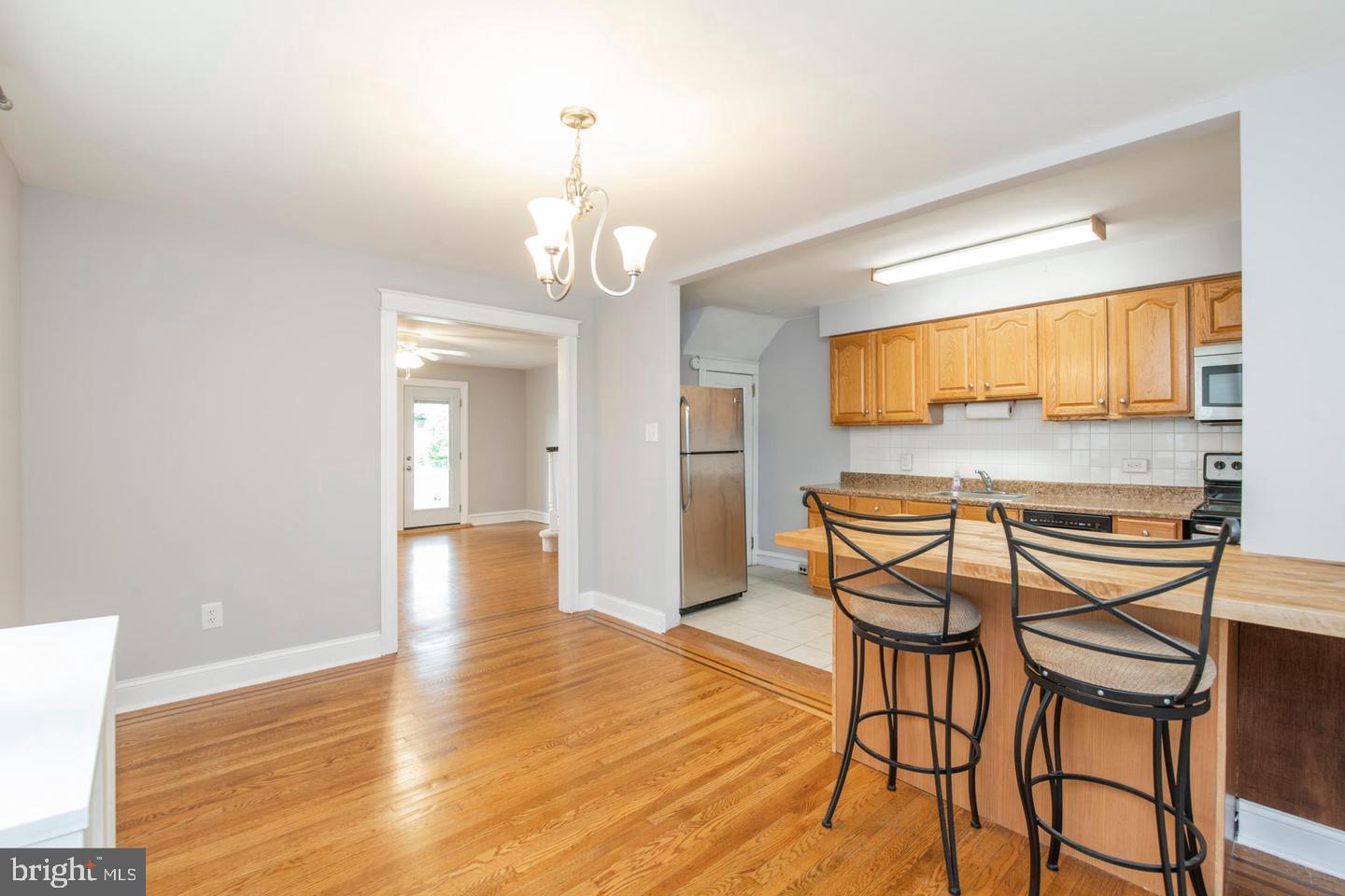 763 Humphreys Road Ardmore, PA 19003 - Photo 9 of 28 a view of a dining room with furniture and wooden floor