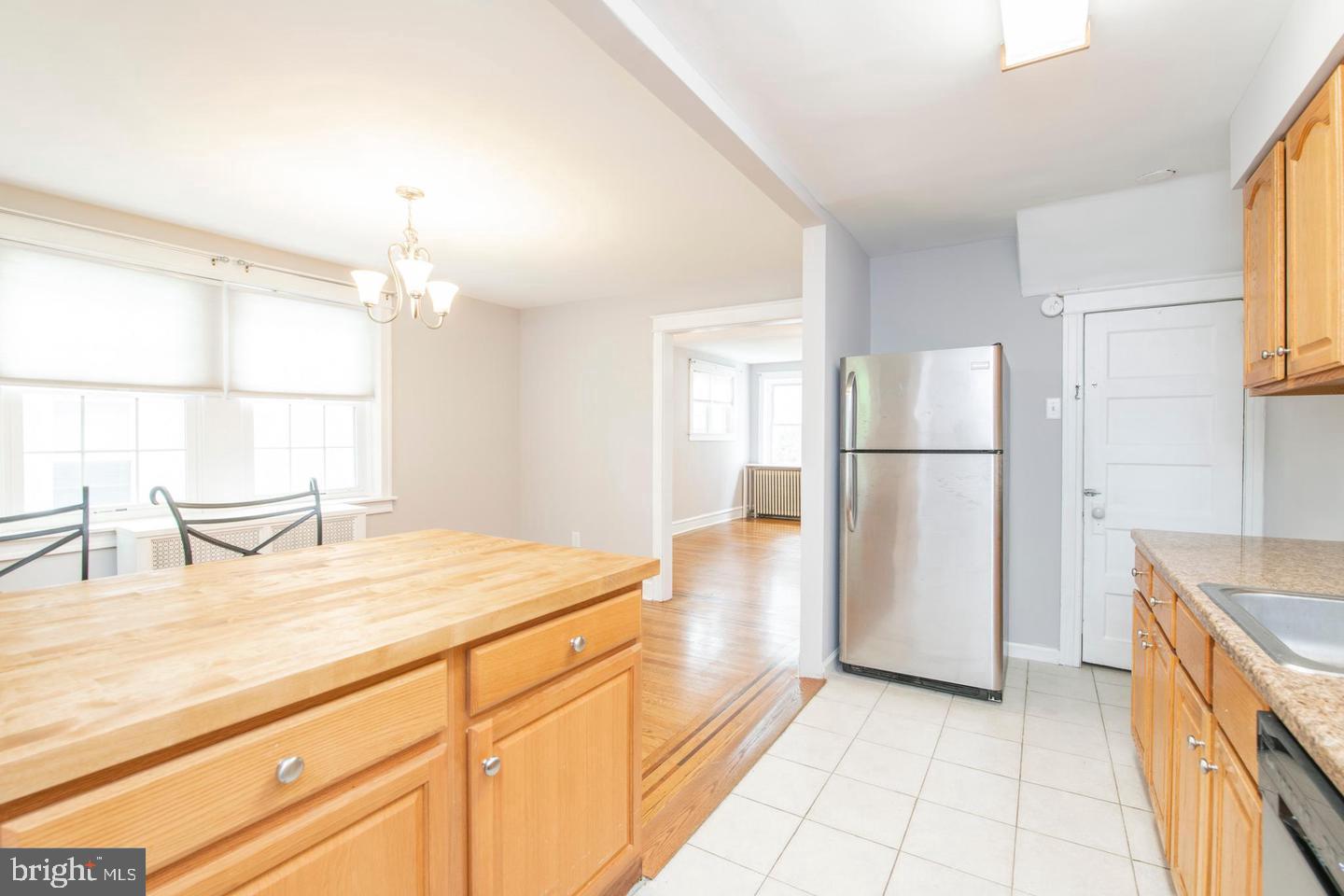 763 Humphreys Road Ardmore, PA 19003 - Photo 10 of 28 a kitchen with a refrigerator a sink and a stove