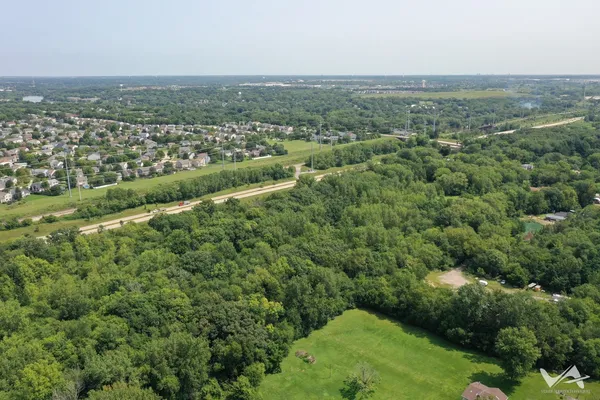 a view of a green field with lots of green space