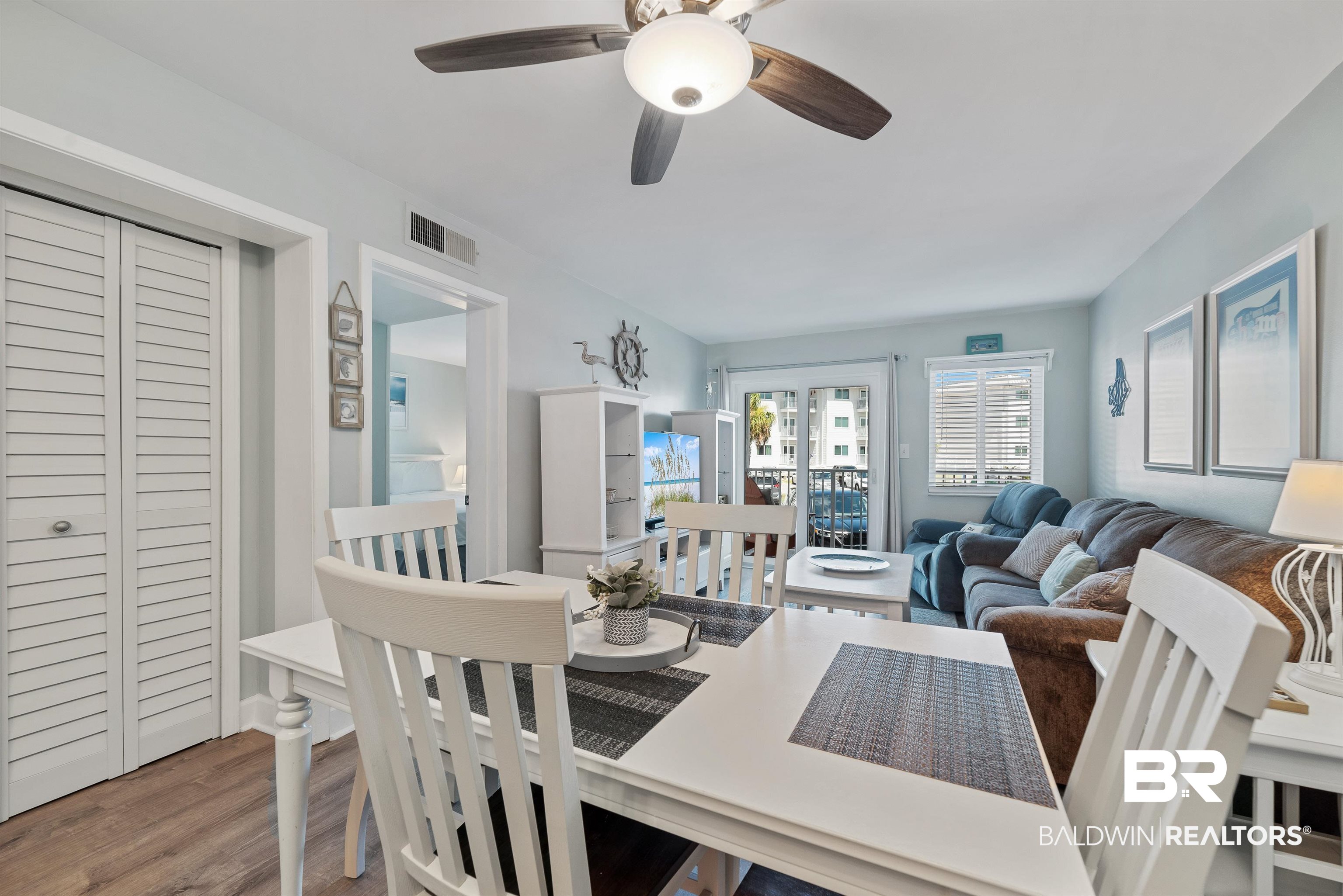 400 Plantation Road, Unit 2123 Gulf Shores, AL 36542 - Photo 9 of 44 Dining space featuring ceiling fan and hardwood / wood-style floors