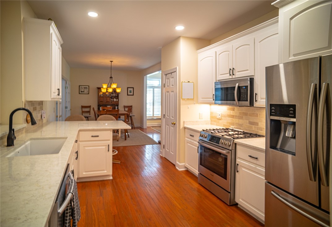409 Colley Lane St. Simons Island, GA 31522 - Photo 7 of 18 Kitchen to Dining