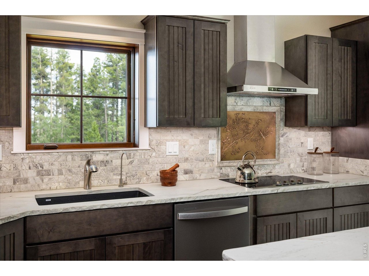 713 Rudi Lane Golden, CO 80403 - Photo 14 of 49 a kitchen with a sink cabinets and appliances