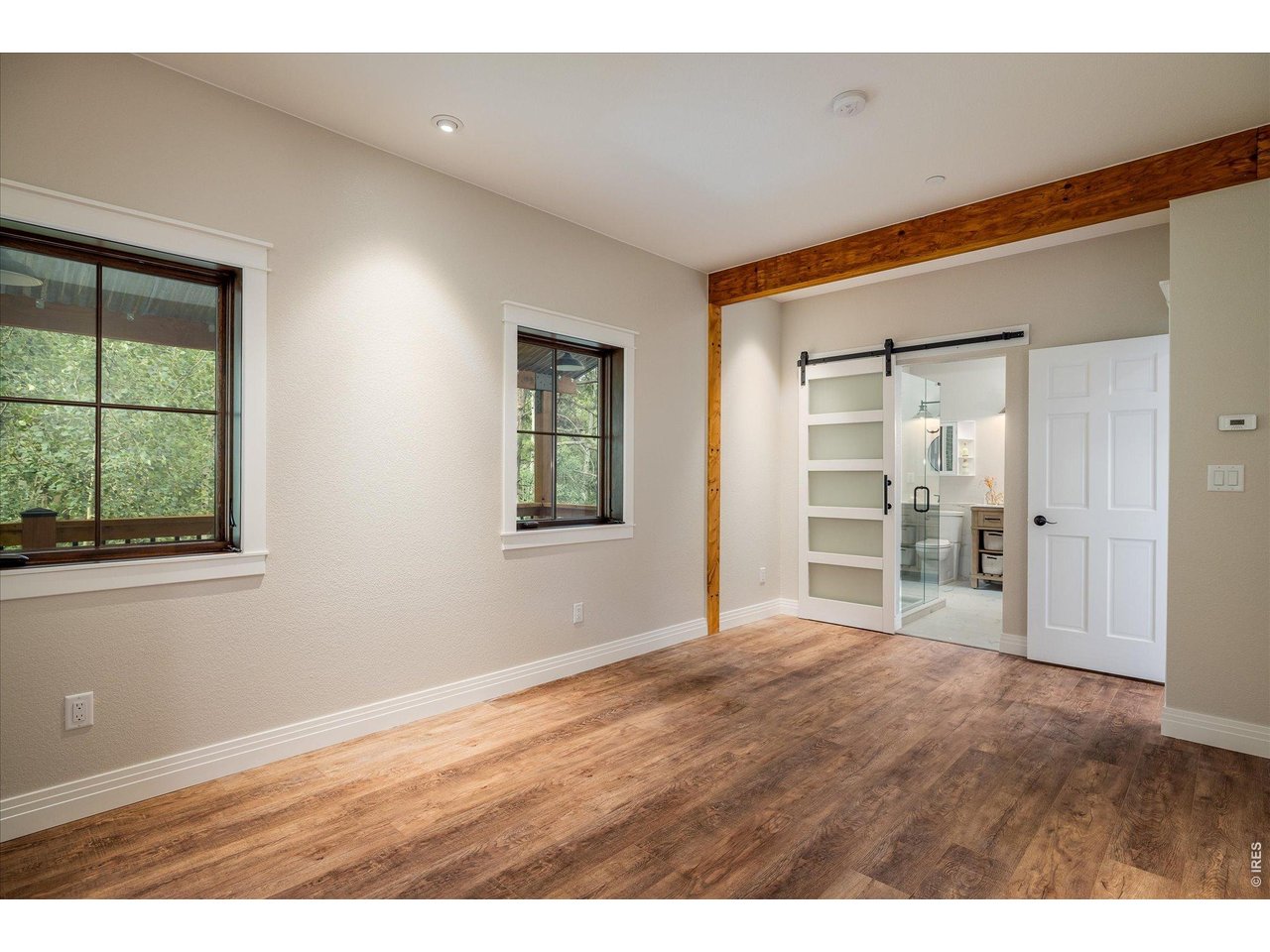 713 Rudi Lane Golden, CO 80403 - Photo 17 of 49 a view of an empty room with a window