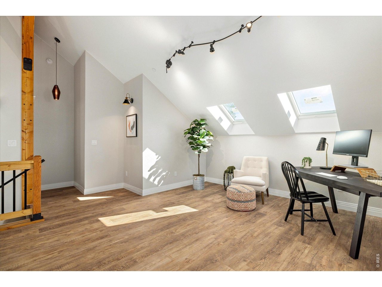 713 Rudi Lane Golden, CO 80403 - Photo 23 of 49 a living room with furniture and wooden floor