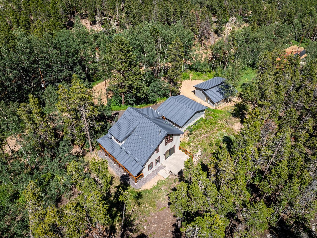 713 Rudi Lane Golden, CO 80403 - Photo 42 of 49 an aerial view of a house with a yard