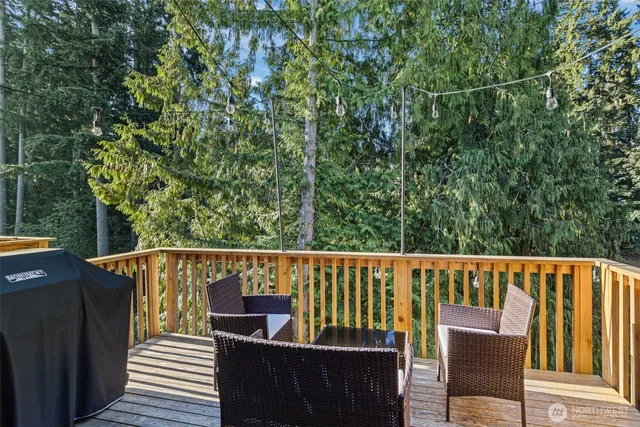 a view of a two chairs in the deck