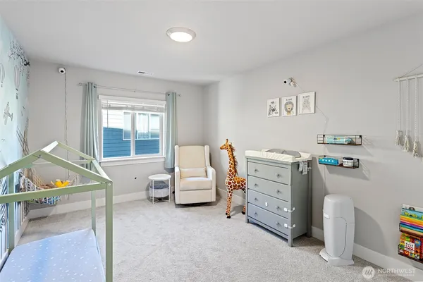 a view of room with cabinet and air hockey table