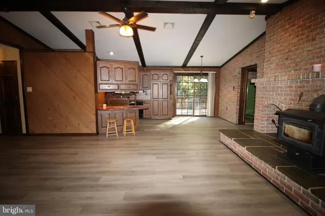 a view of a living room and a kitchen