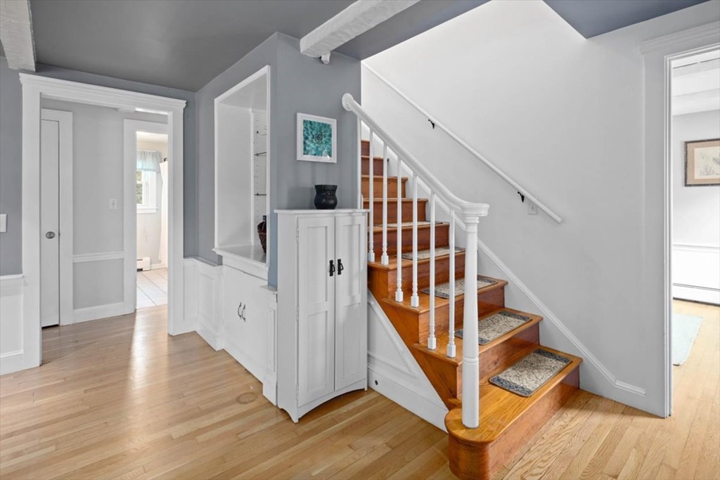 53 Winter Street Kingston, MA 02364 - Photo 18 of 28 a view of entryway with wooden floor and stairs