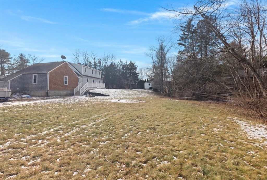 53 Winter Street Kingston, MA 02364 - Photo 25 of 28 a front view of a house with a yard