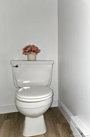 a close view of a toilet in a room