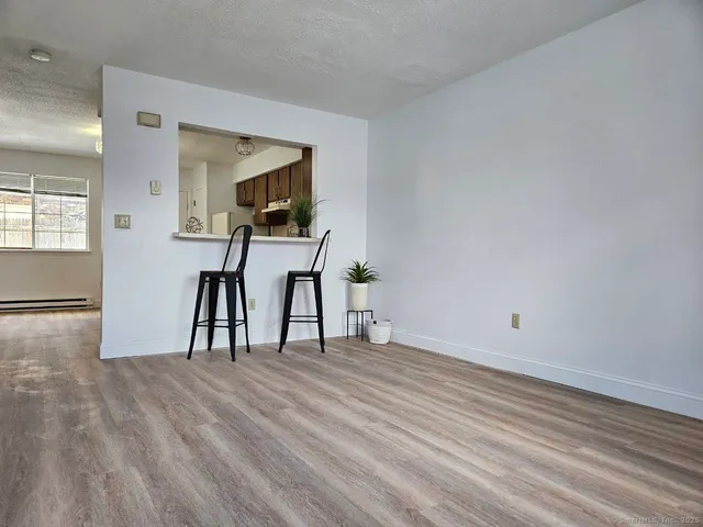 a view of a livingroom with a furniture