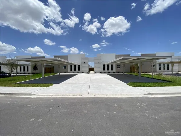 a view of house with yard