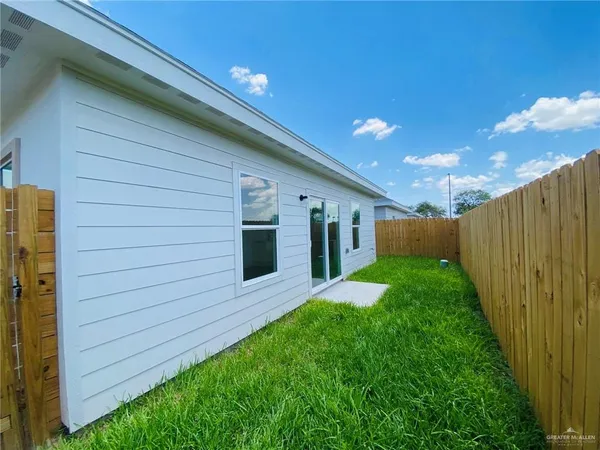 a view of a backyard with plants