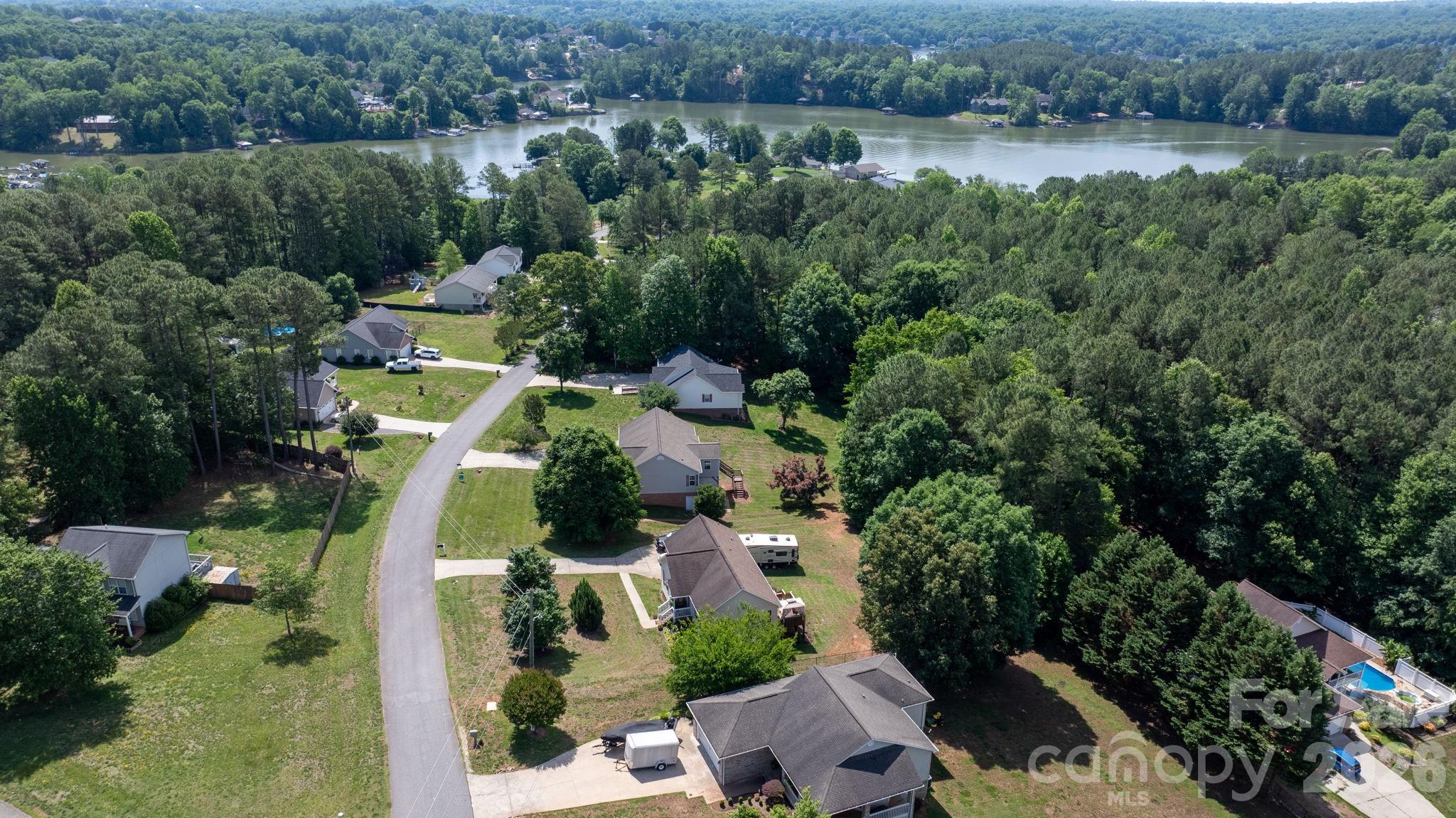 4967 Addison Lane Hickory, NC 28601 - Photo 43 of 43 an aerial view of a house with a yard and lake view