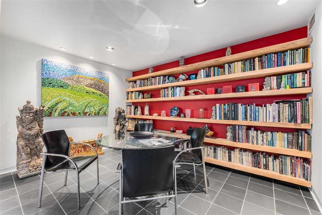 10406 Crestover Drive Dallas, TX 75229 - Photo 11 of 30 a workspace with furniture and a book shelf